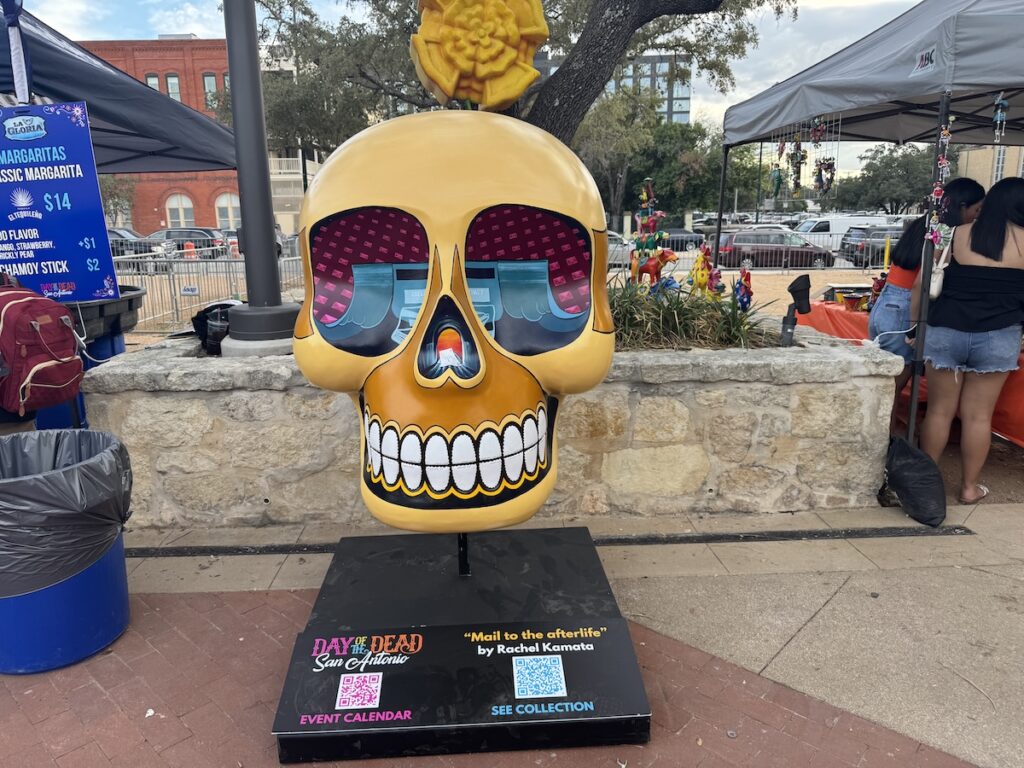 A yellow skull with reflections in the eyes.