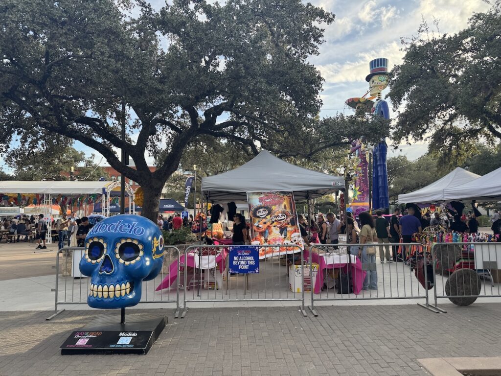 A skull in Modelo branding stands in front of La Villita in San Antonio.
