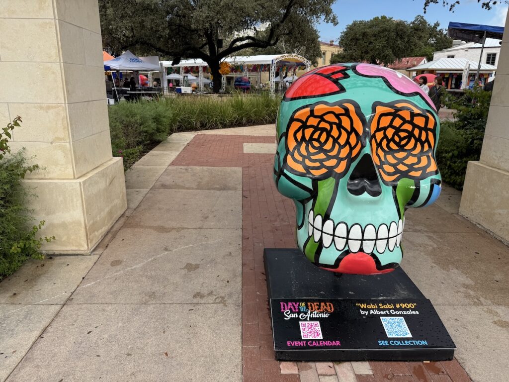 Colorful skull with flower eyes in La Villita.